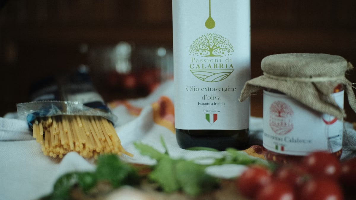 Calabrian olive oil and Italian pasta with fresh ingredients, perfect for authentic dishes.